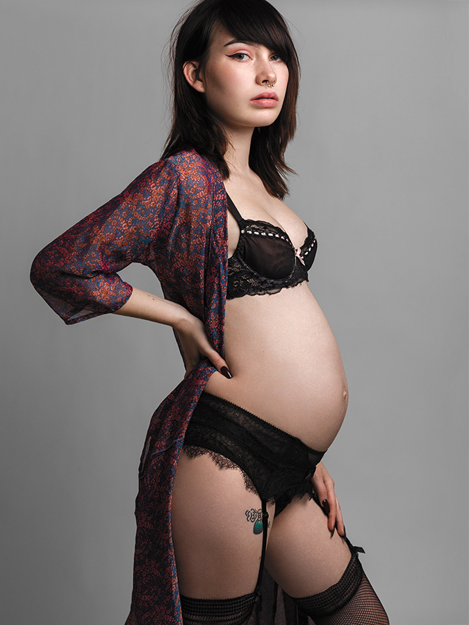 Pregnant woman Eartha Celeste photographed in lingerie and kimono with hand on hip by Joshua Pyles